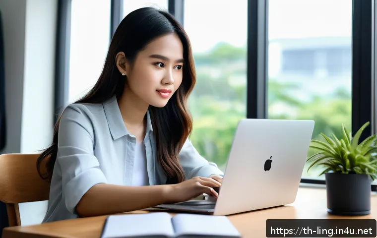 화자의 정체성 - A confident young Thai woman sitting at a modern desk with a laptop, thoughtfully customizing her so...